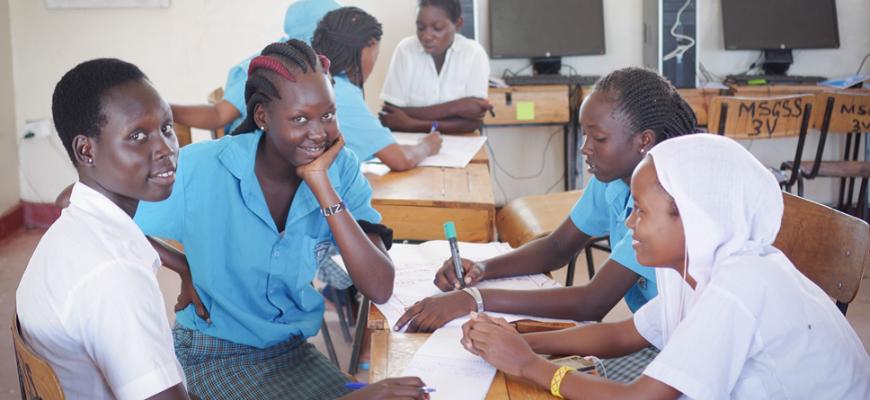 Girls working on the mock-up of their website