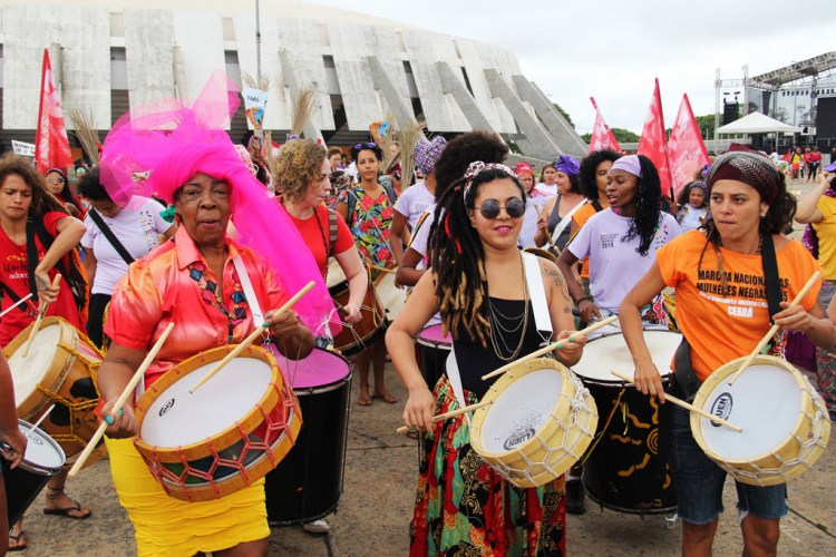 Photo: women take part in the Black Women's March against Racism and Violence in Brasilia, Brazil, on 18 November 2015.