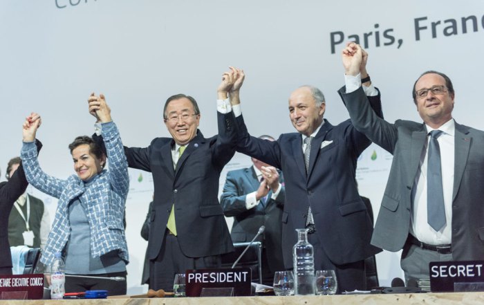 Photo: On 12 December 2015, the 196 parties to the UN Framework Convention on Climate Change (UNFCCC) adopted the Paris Agreement. Secretary-General Ban Ki-moon (third right) called the negotiations the “most complicated, most difficult, but most important for humanity.” Also pictured, UNFCCC’s Christiana Figueres; French Foreign Minister Laurent Fabius and President of the UN Climate Change Conference (COP21); and French President François Hollande (right). UN Photo/Mark Garten